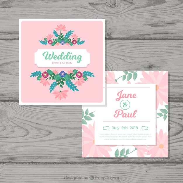 Tarjeta de invitación de boda con adornos florales