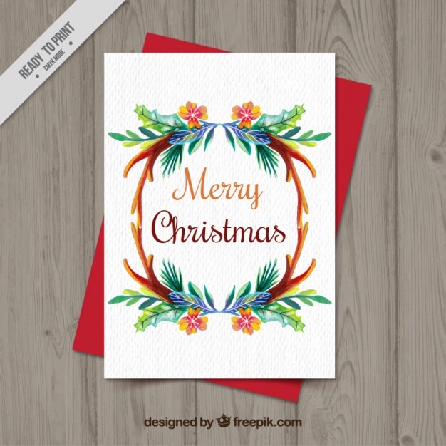 Tarjeta de navidad en acuarela con motivos florales