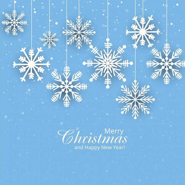 Tarjeta de papel de Navidad con copos de nieve colgantes de fondo