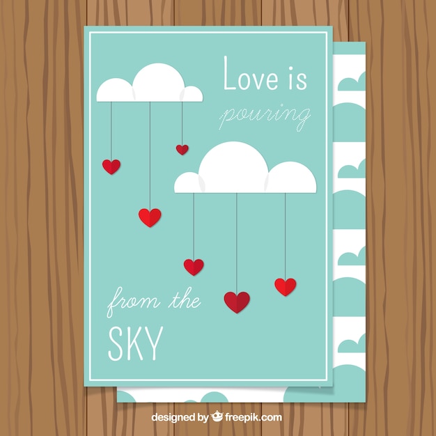 Tarjeta romántica con nubes y corazones colgando