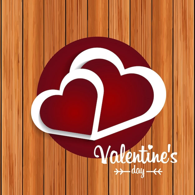 Vector gratuito tarjeta de san valentín con fondo de madera