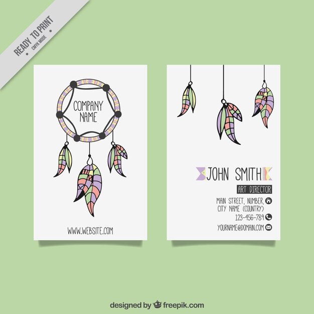 Tarjeta de visita decorativa con atrapasueños y plumas