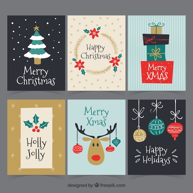 Vector gratuito tarjetas de navidad dibujadas a mano