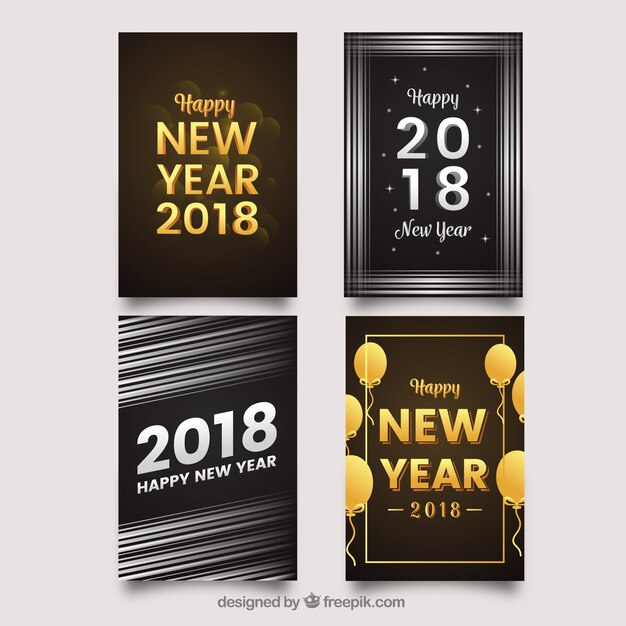 Tarjetas verticales doradas y plateadas de año nuevo