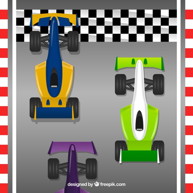 Tres coches de formula 1 pasando línea de meta