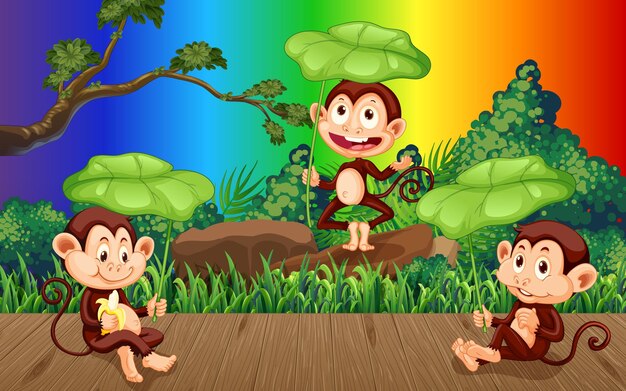 Tres monos en el bosque sobre fondo de arco iris degradado