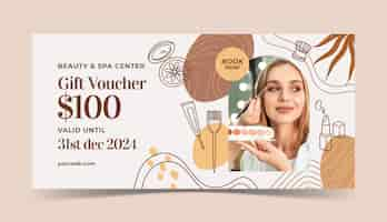 Vector gratuito vale de regalo de salón de belleza dibujado a mano