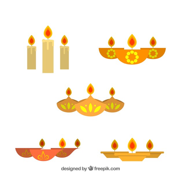 Varias velas de diwali en diseño plano 