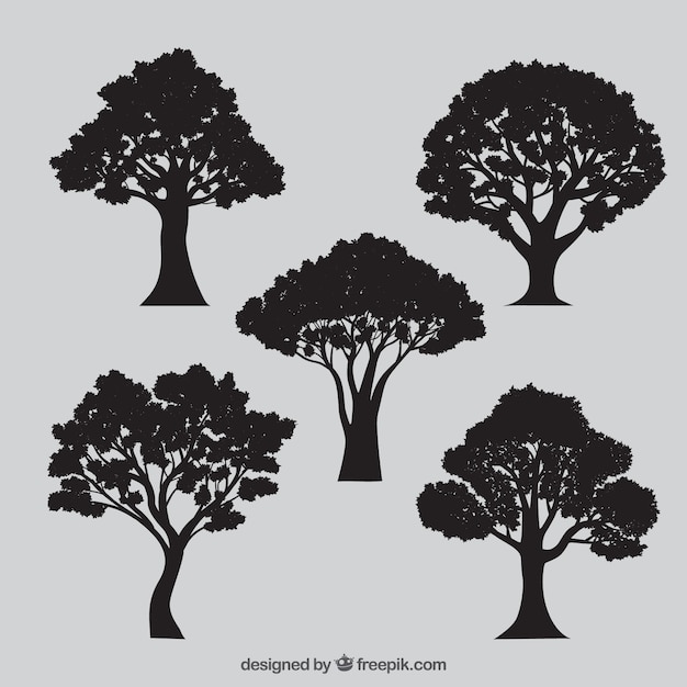 Vector gratuito variedad de siluetas de árboles
