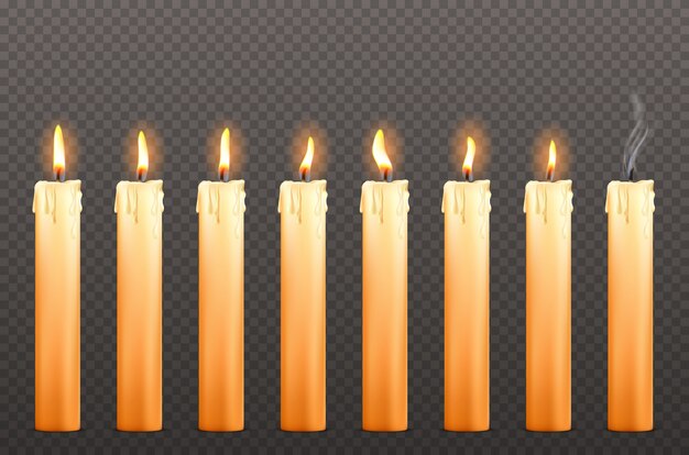 Velas con diferentes llamas de fuego y gotas de cera.