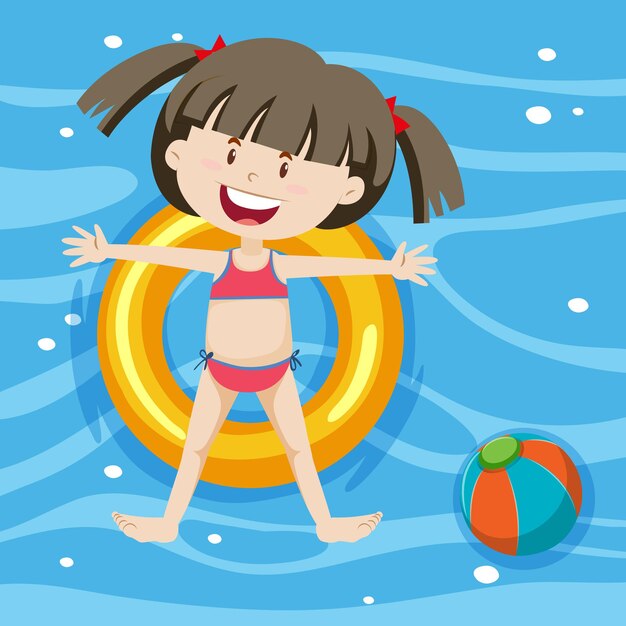 Vista superior de una niña en anillo de natación en el fondo de la piscina