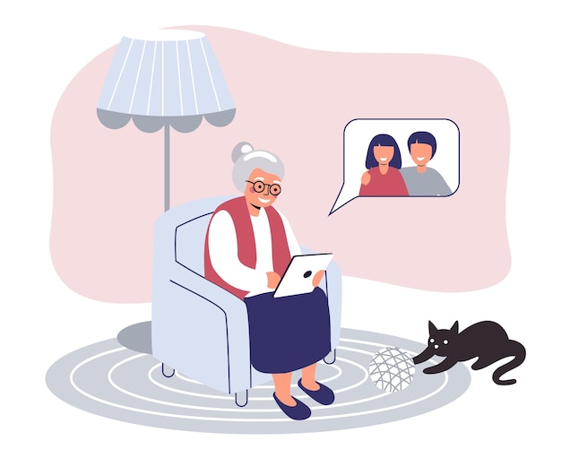 Abuela feliz con laptop llama a nietos Linda anciana trabajando