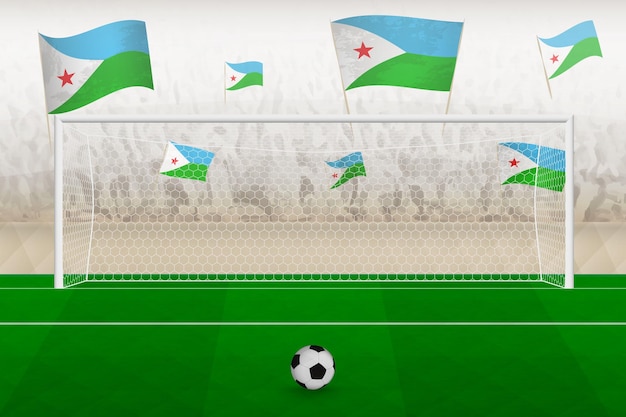 Aficionados del equipo de fútbol de Djibouti con banderas de Djibouti animando el concepto de tiro penal del estadio en un partido de fútbol