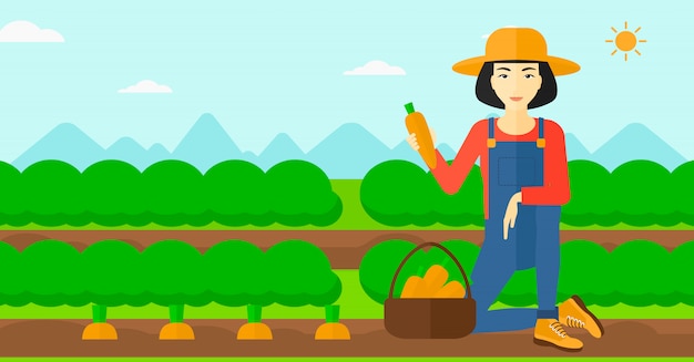 Agricultor recolectando zanahorias.