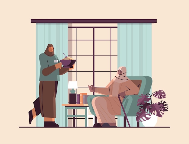 Amable enfermera árabe o voluntario que lleva comida a los servicios de atención domiciliaria de la anciana, servicios de atención médica y apoyo social