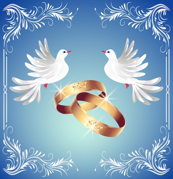Anillos de bodas y dos palomas