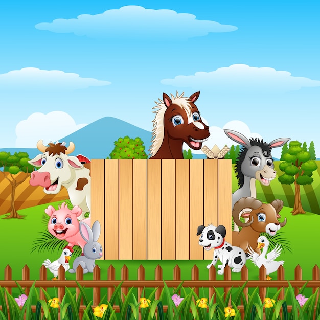 Animales de granja con un cartel en blanco de madera