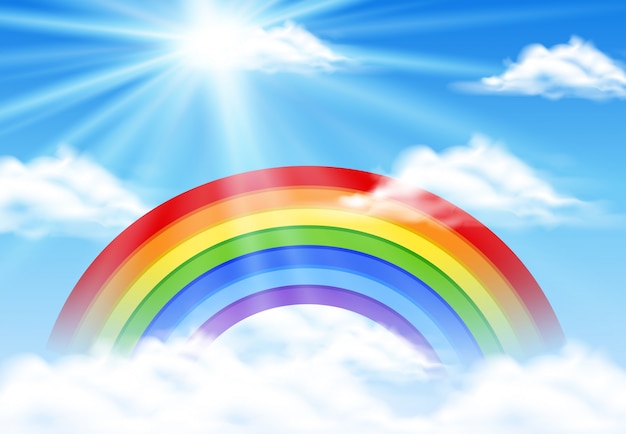 El arco iris de colores en el cielo azul