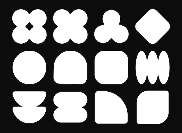 Assortment of abstract white shapes on a black background