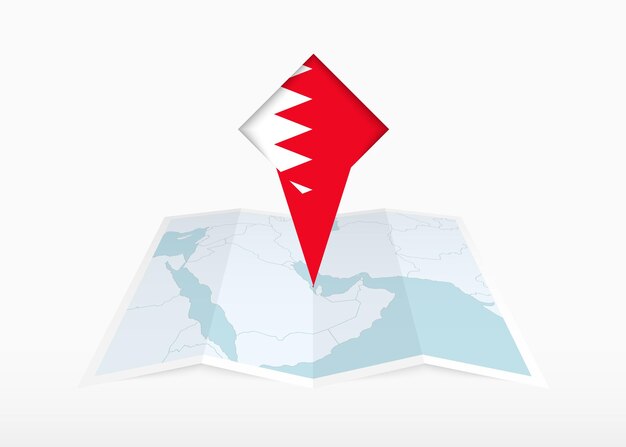 Bahrein está representado en un mapa de papel plegado y marcador de ubicación fijado con la bandera de Bahrein.