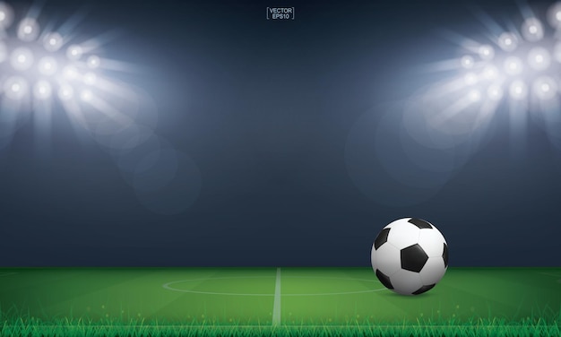 Balón de fútbol y la hierba verde del fondo del estadio del campo de fútbol. ilustración vectorial.