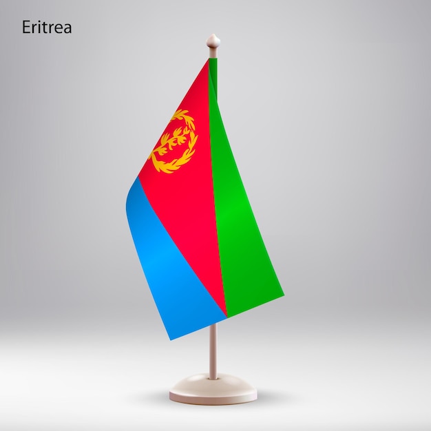 La bandera de Eritrea colgando en un soporte de bandera