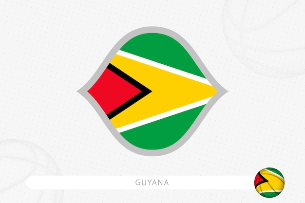 Bandera de Guyana para la competición de baloncesto sobre fondo de baloncesto gris.