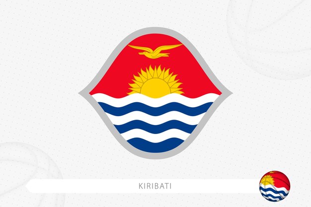 Bandera de Kiribati para la competencia de baloncesto sobre fondo de baloncesto gris.
