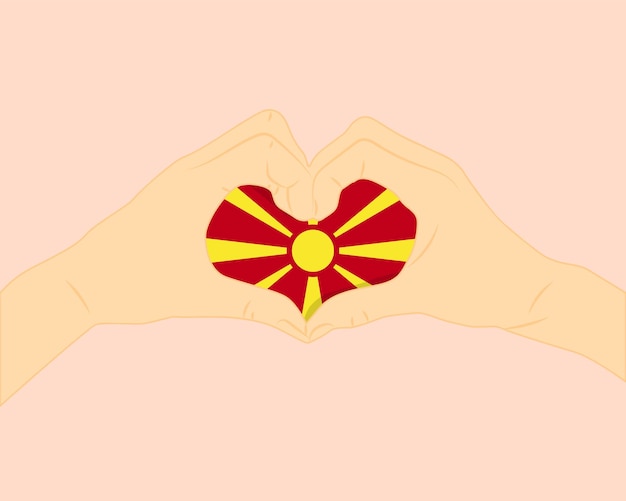 Vector bandera de macedonia con dos manos forma de corazón expresar amor o afecto concepto