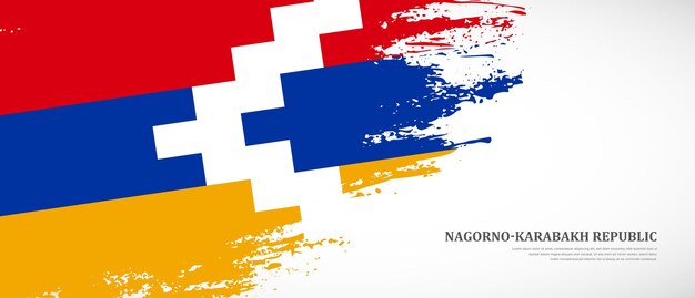 Vector bandera nacional de la república de nagorno-karabaj con fondo de banner de bandera de pincel texturizado dibujado a mano