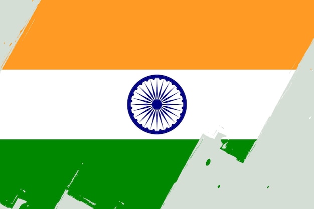 una bandera naranja verde y blanca con el emblema nacional