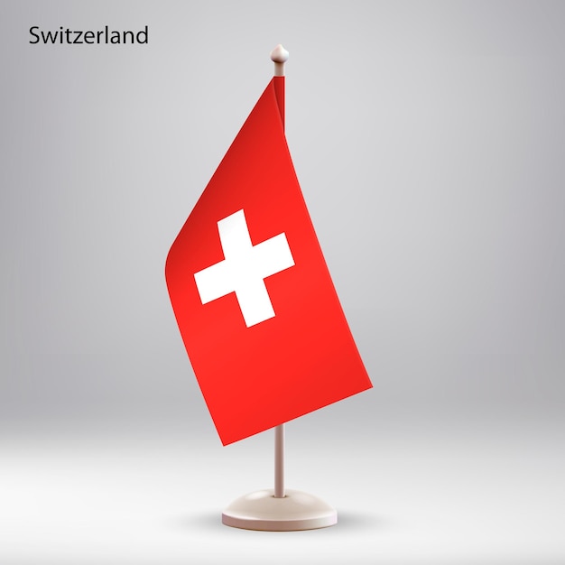 La bandera de Suiza colgando en un soporte de bandera