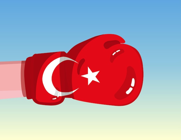 Bandera de turquía en guante de boxeo enfrentamiento entre países con poder competitivo