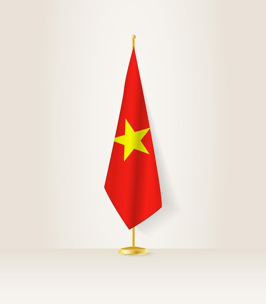 Vector bandera de vietnam en un soporte de bandera