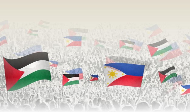 Banderas de palestina y filipinas en una multitud de gente aplaudiendo