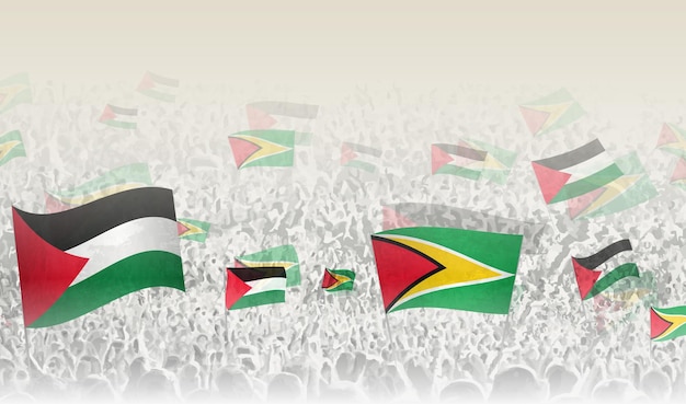 Banderas de Palestina y Guyana en una multitud de personas que aplauden