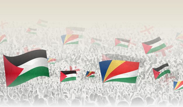 Banderas de Palestina y Seychelles en una multitud de personas que aplauden