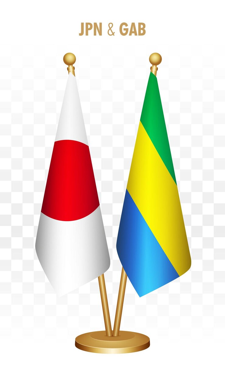 Vector banderas de pie de japón y gabón aisladas en una bandera de escritorio japonesa blanca
