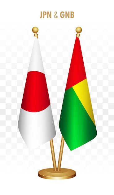 Banderas de pie de Japón y Guinea Bissau aisladas en una bandera de escritorio japonesa blanca