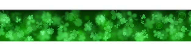 Banner en el día de san patricio hecho de hojas de trébol borrosas en colores verdes con repetición horizontal perfecta