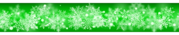 Banner de Navidad de copos de nieve claros y borrosos complejos en colores blancos sobre fondo verde. Con repetición horizontal