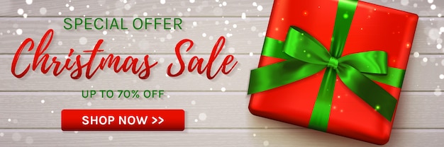 Vector banner de venta de navidad con caja de regalo.