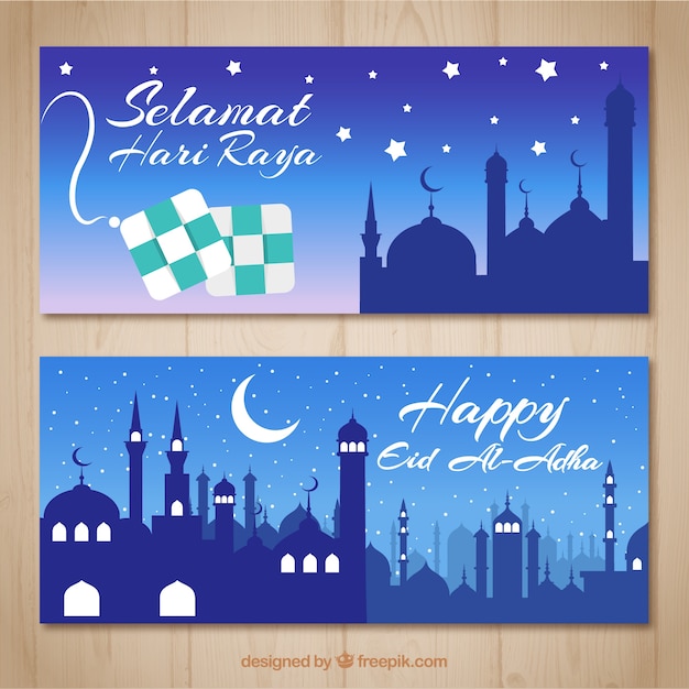 Banners con la silueta de una mezquita por la noche