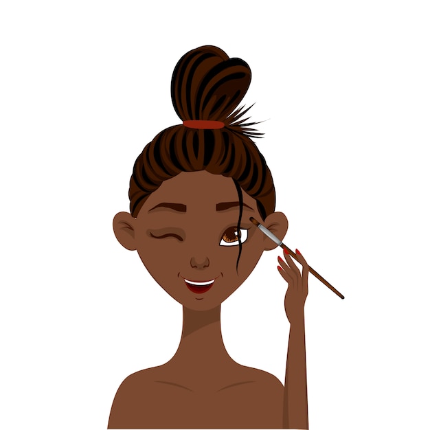 Belleza mujer africana aplica sombra de ojos.