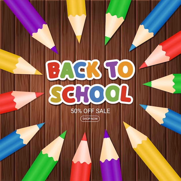 Bienvenido de nuevo al colegio. Cartel con lápices de colores y frase sobre fondo de madera. Banner de venta