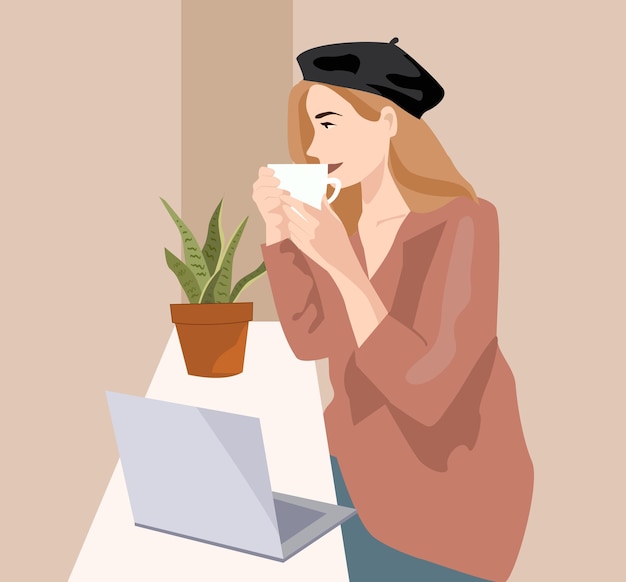 Una boina negra de mujer y un abrigo, bebe café y lee una computadora portátil