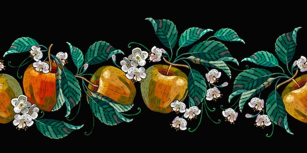 Bordados, manzanas y flores blancas.