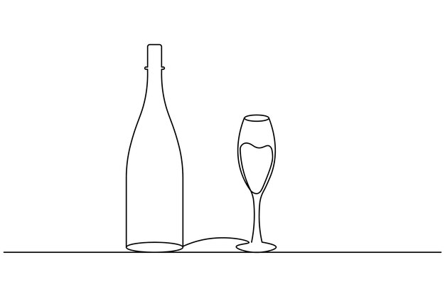 una botella de vino y una copa de vino sobre una mesa