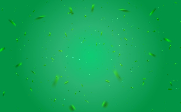 La caída de confeti verde brillante aislado en el fondo verde