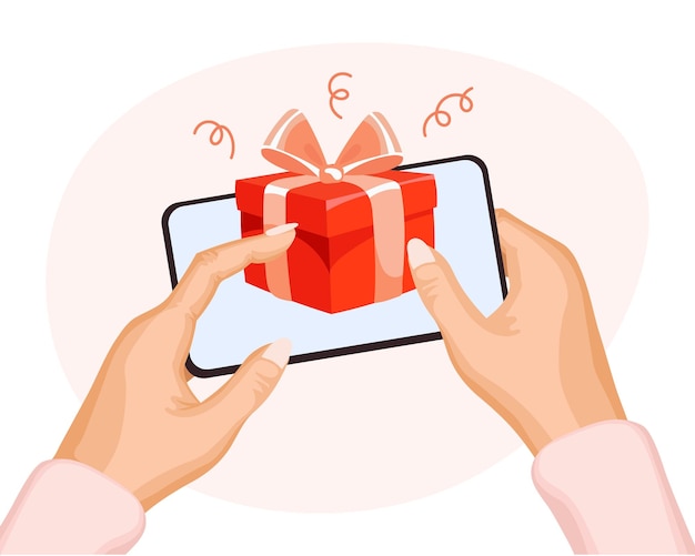 Caja de regalo roja con un lazo en un teléfono móvil en las manos. El concepto de felicitaciones virtuales.